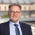 Dr. Rainer Dvorak am Schreibtisch (kurz vor dem Auszug aus dem Büro)